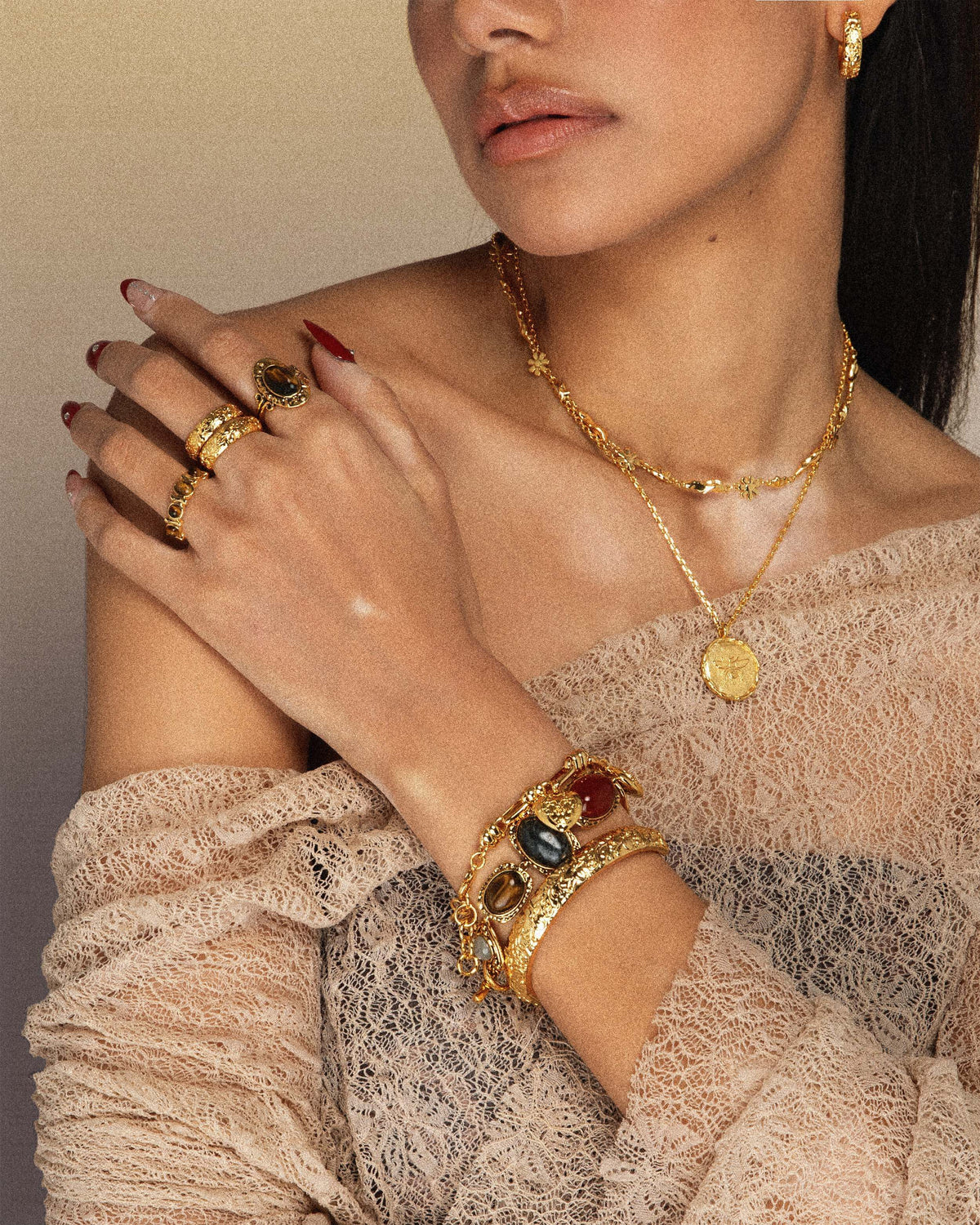 Juego de pulsera y anillo Athena en oro