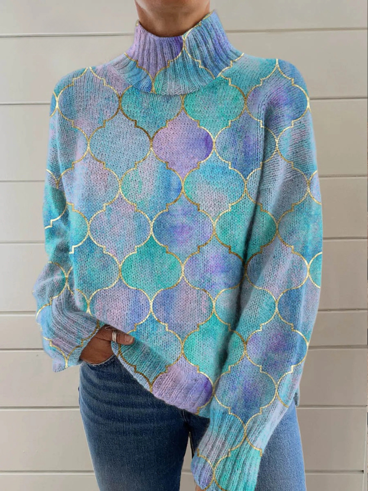 Celeste | Jersey de cuello alto con diseño artístico