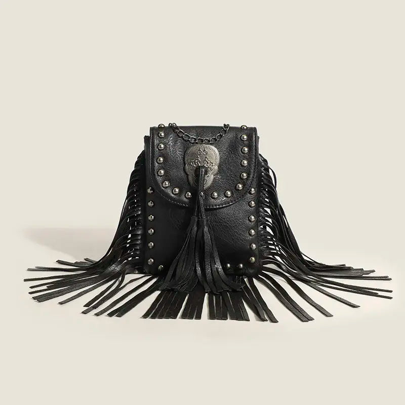 Bolso de hombro Rebel con borlas