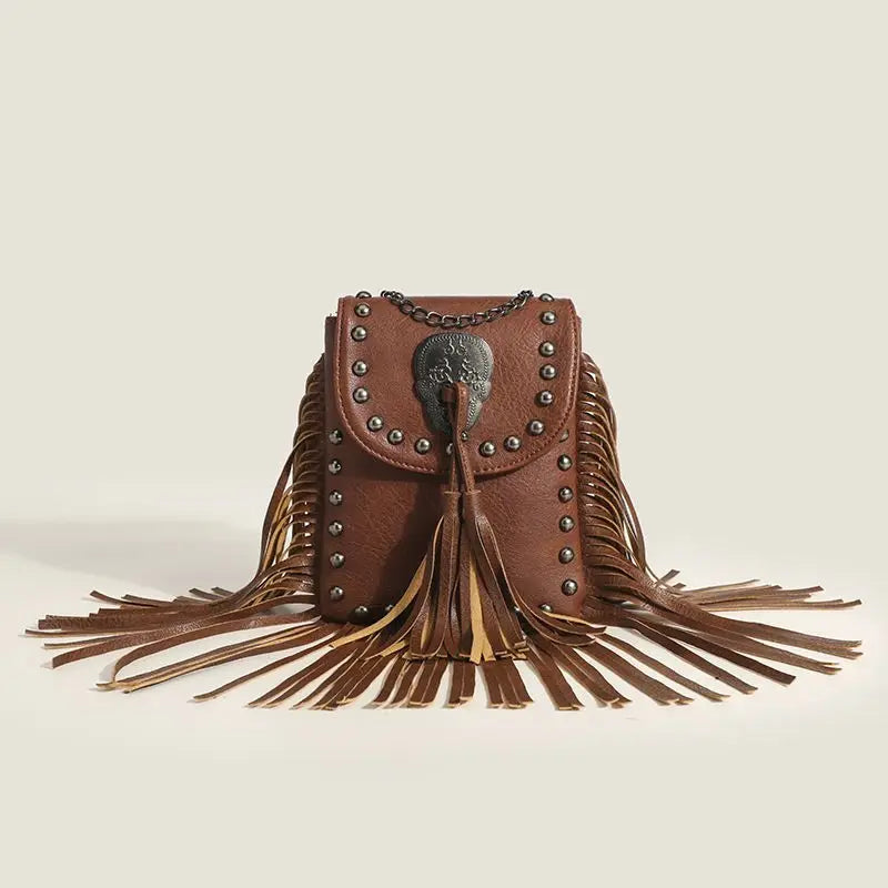 Bolso de hombro Rebel con borlas