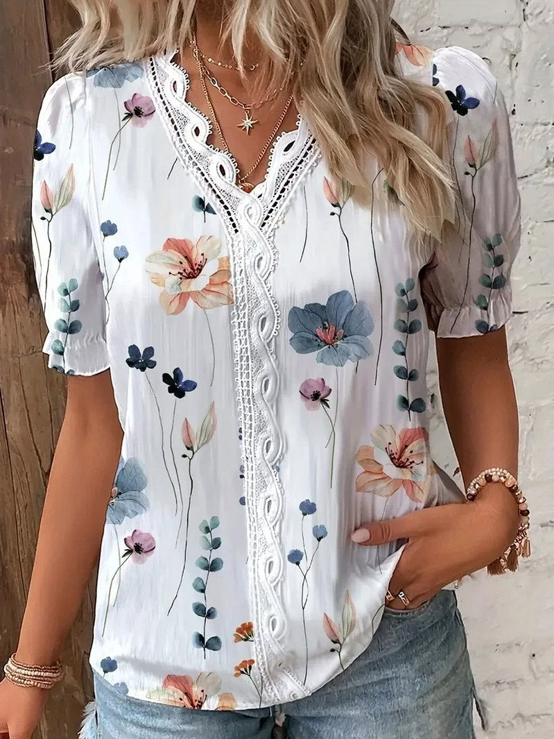 Maria | Blusa de encaje floral con mangas abullonadas