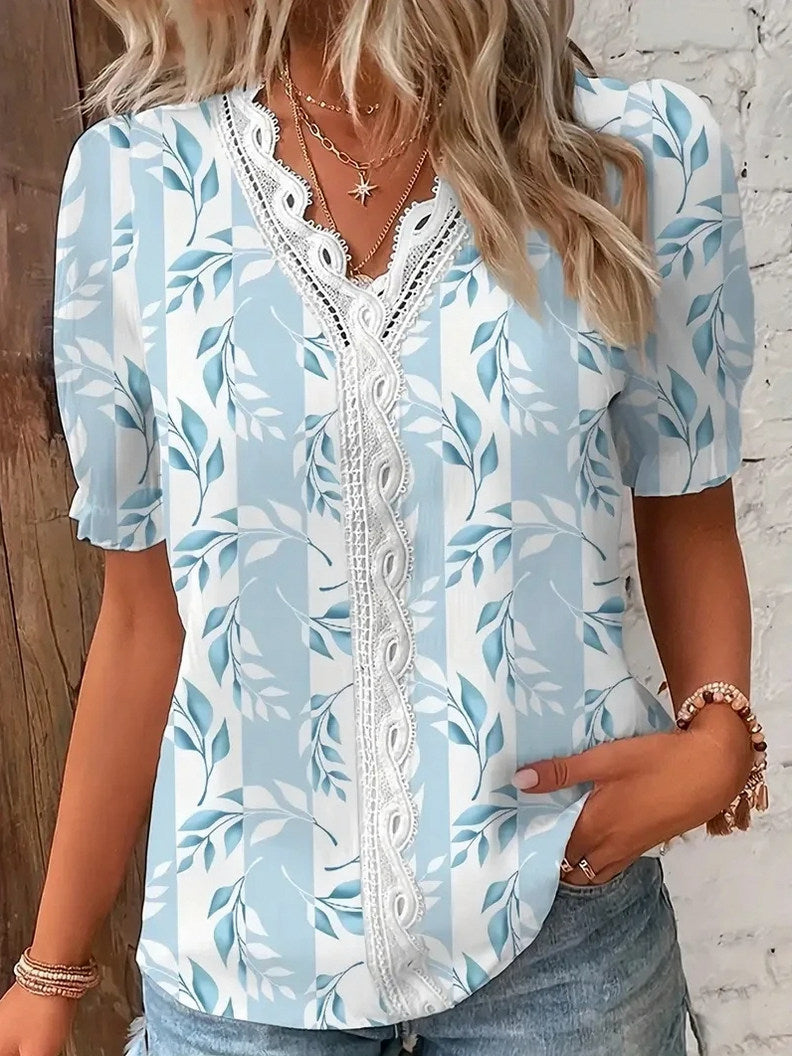 Maria | Blusa de encaje floral con mangas abullonadas