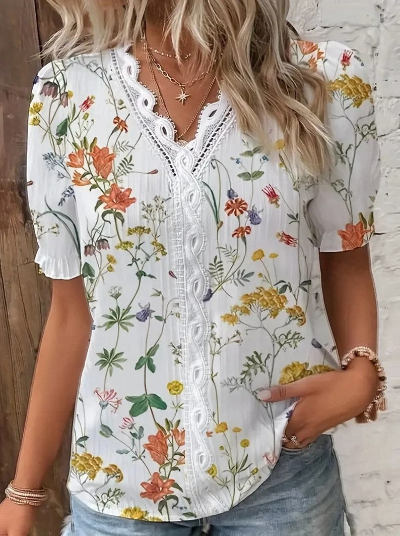 Maria | Blusa de encaje floral con mangas abullonadas