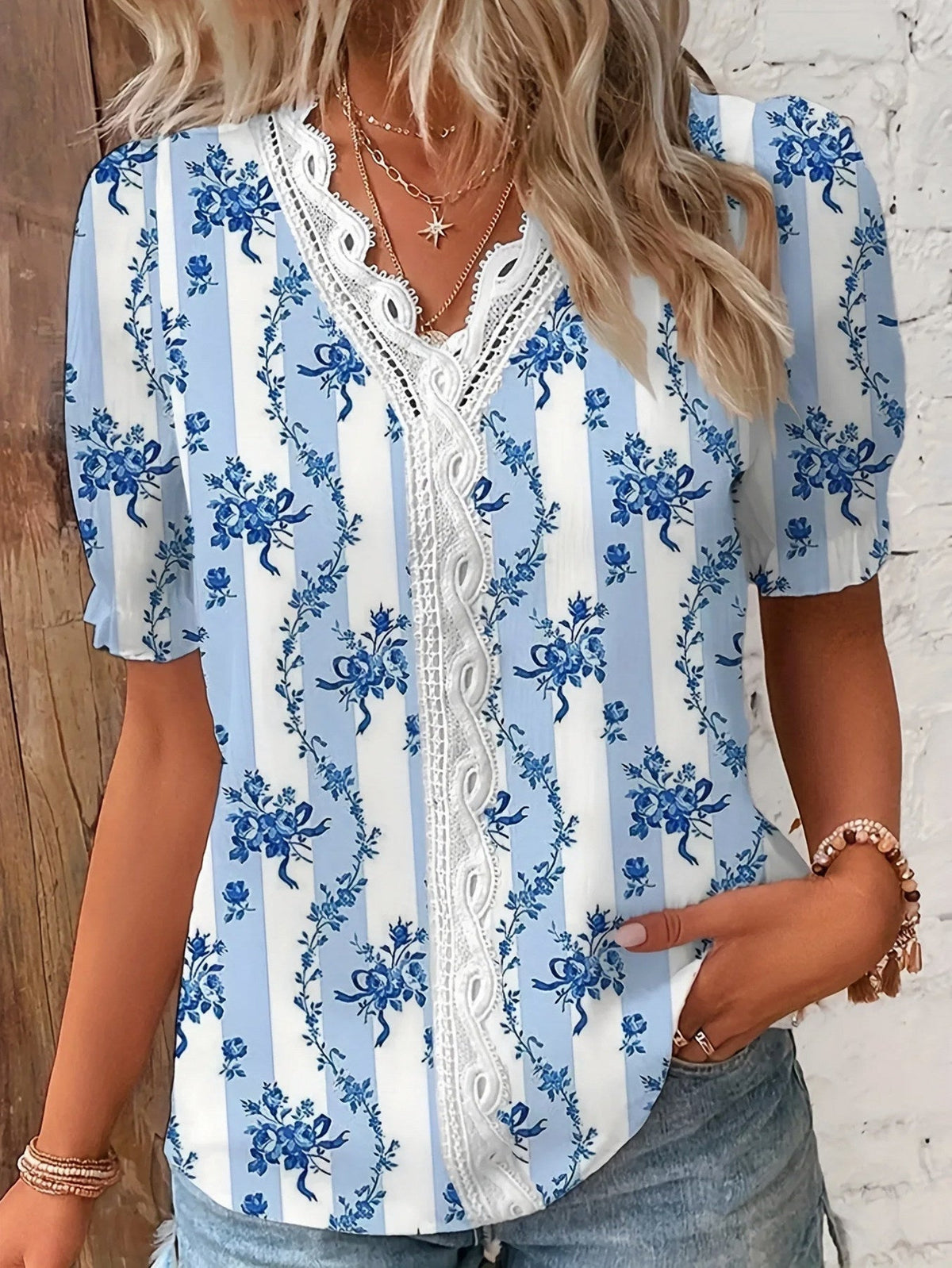 Maria | Blusa de encaje floral con mangas abullonadas