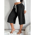 Pantalones acanalados de pierna ancha